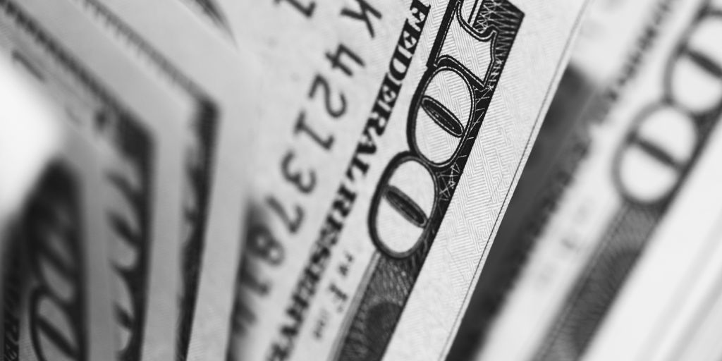 What is Money Laundering? 4 closeup photo of 100 US dollar banknotes